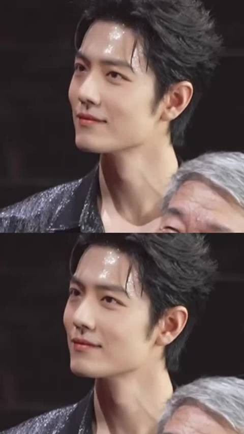 肖战内场汗如雨下，为了缓解炎热，他小动作不断太可爱