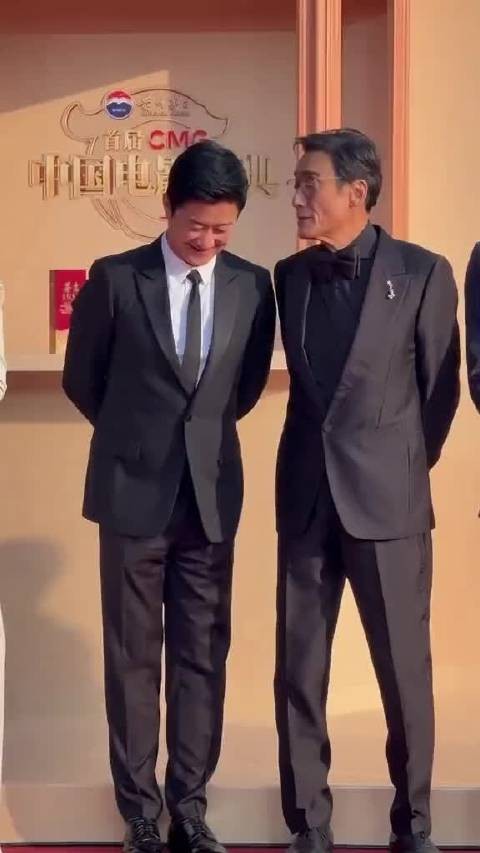 梁家辉此沙吴京于适亮相电影盛典红毯